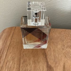 1.0 oz used Burberry Brit for her perfume.